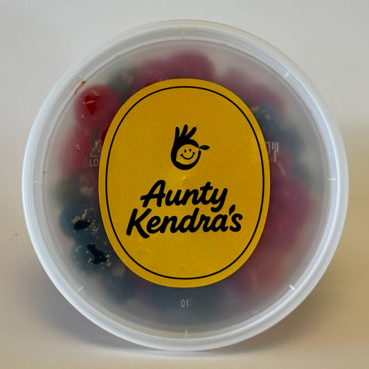 Aunty Kendra's Juicy Bursts: Fruit snacks with a liquid center, coated in signature Li Hing Mui powder and lemon peel.