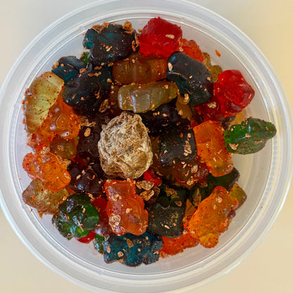 Aunty Kendra's Li Hing Mui Gummy Bears: Colorful bears tossed in signature li hing powder and lemon peel with a whole dried plum.